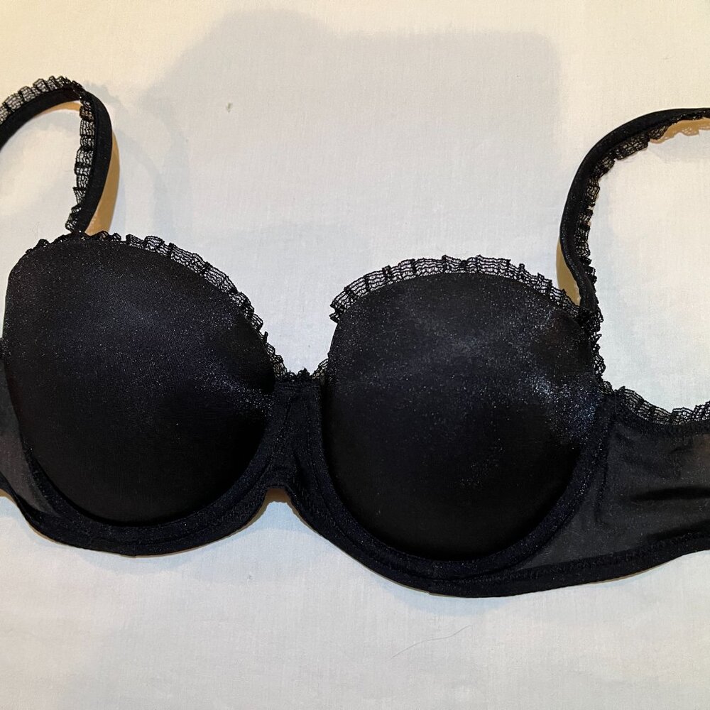 Sexy DKNY sparkly black bra with lacy ruffles. Like new. Size 32D.